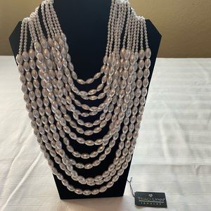 Large white pearls statement necklace.